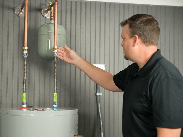 Code-complete installs: pan, expansion tank, venting — no shortcuts
